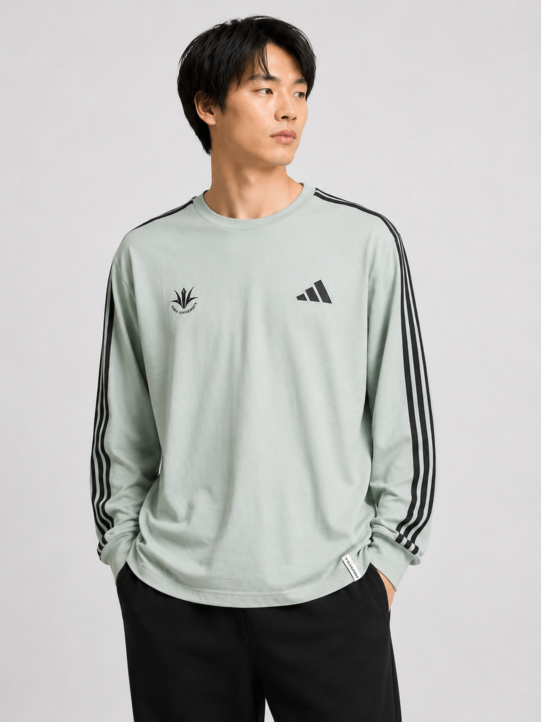【アディダス×創価大学】エッセンシャル プラス ルーズフィット スリーストライプス シングルジャージー 長袖Tシャツ（ワンダーセージ）（グリーン系）